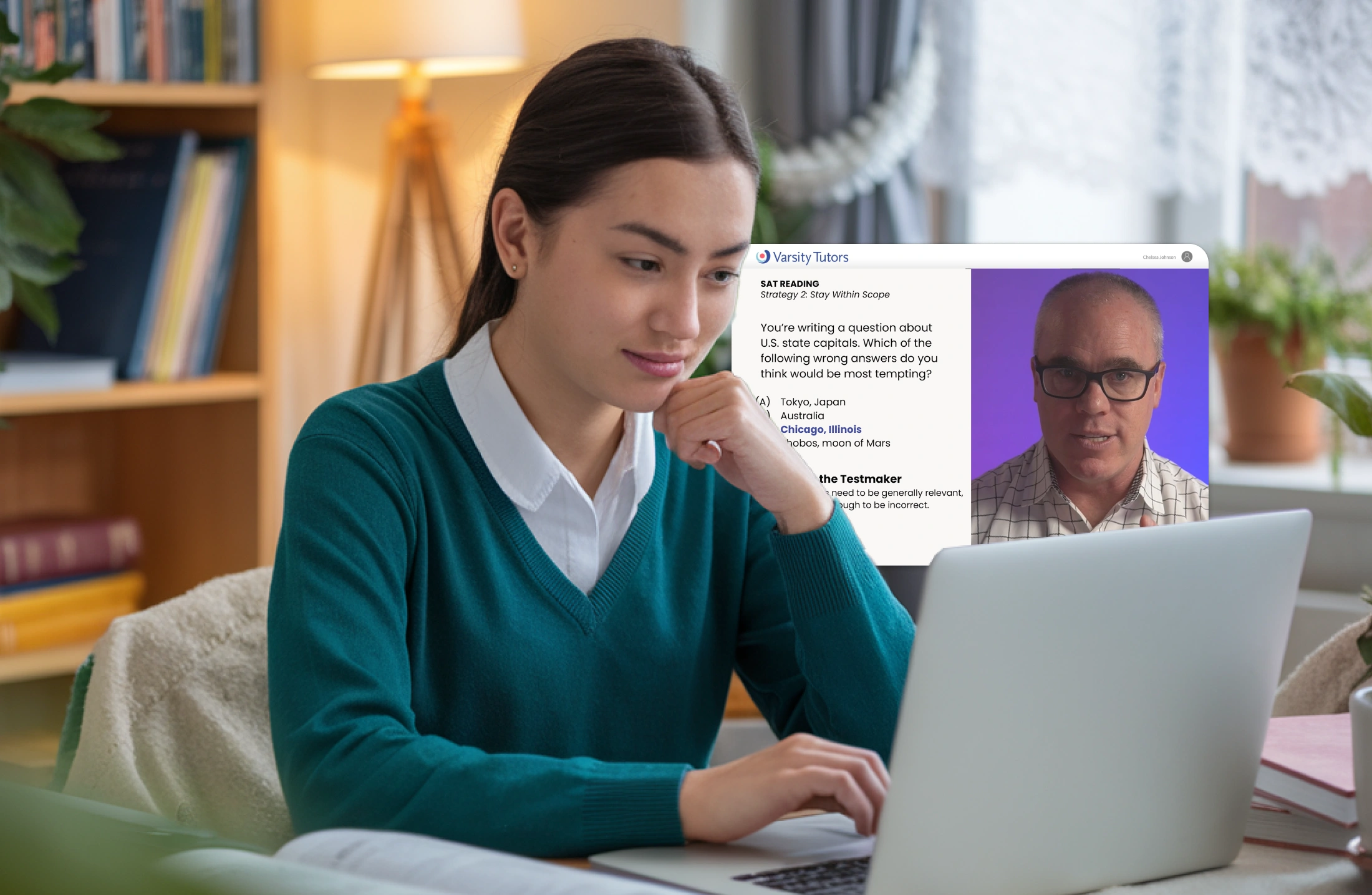 College student using her laptop to research Varsity Tutors