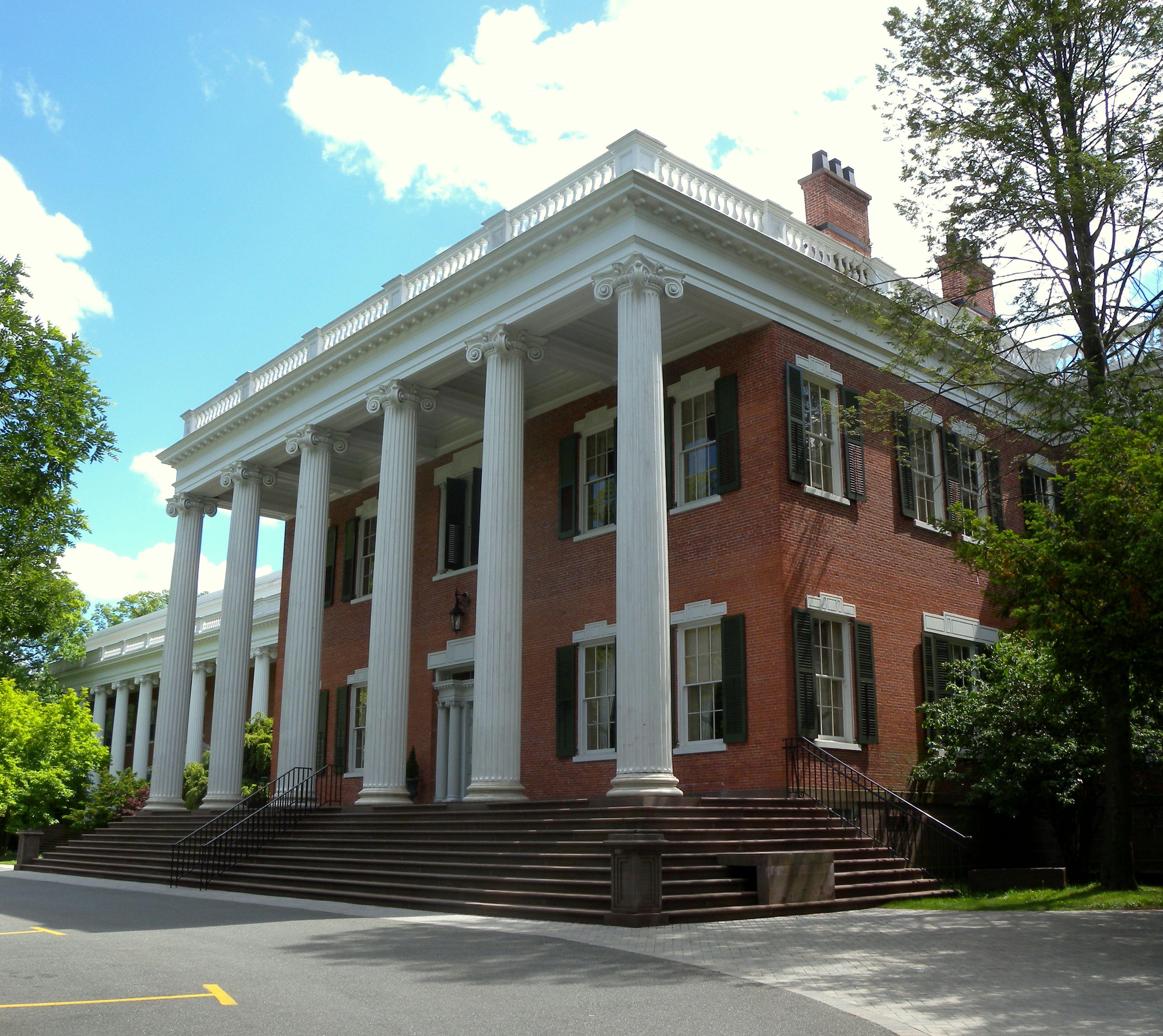 Looking south at Mead Hall, an 1836 Greek Revival house on the Drew University campus, New Jersey, on a mostly sunny early afternoon. See also File:Mead Hall sign Drew U jeh.jpg.