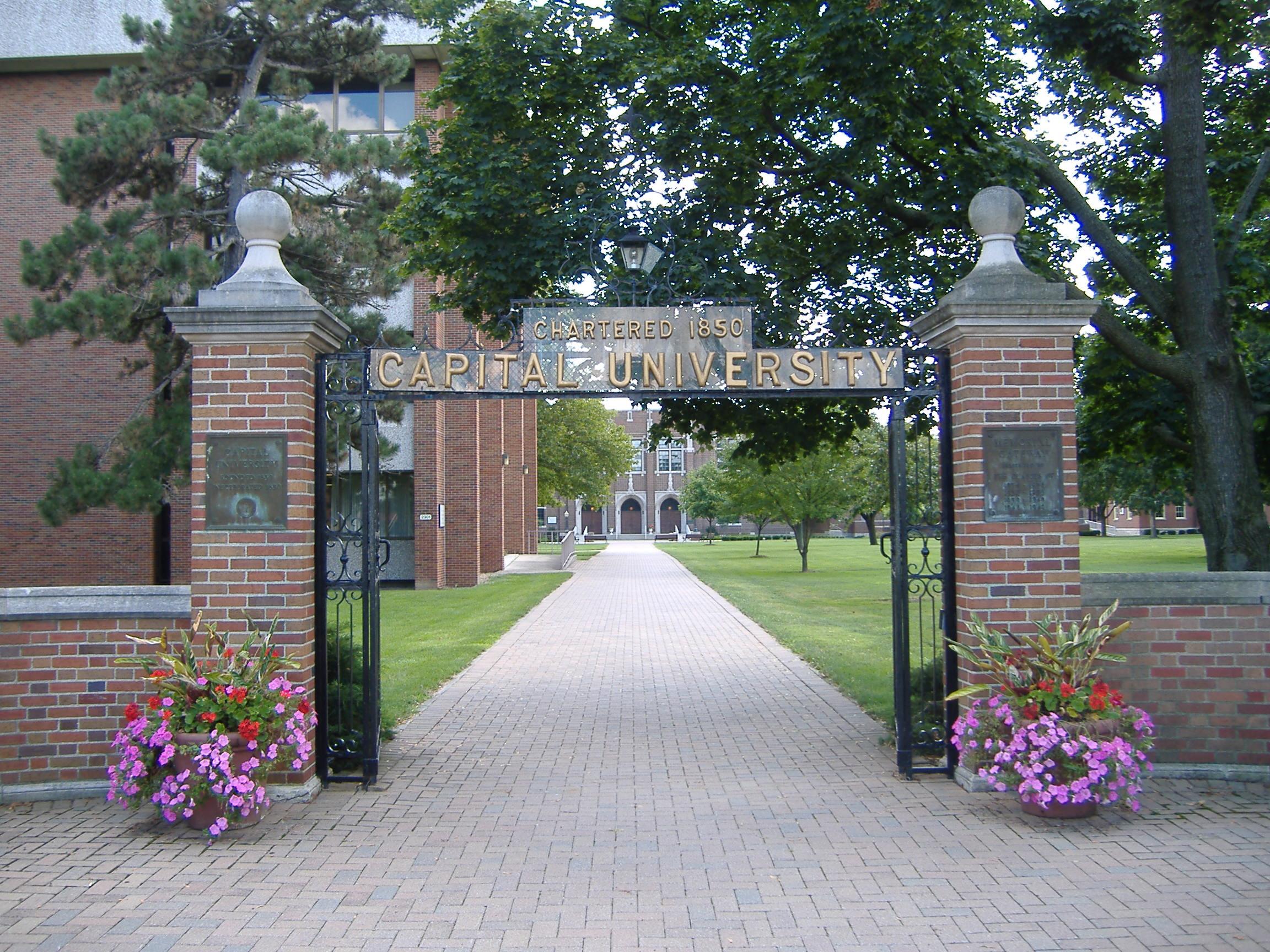 Gateway to the Capital University campus in Bexley, Ohio, USA, located on East Main Street opposite Drexel Avenue. On the left is the Josiah H. Blackmore Library, and in the far background is Mees Hall. Mees Hall is a part of the Capital University Historic District, listed on the National Register