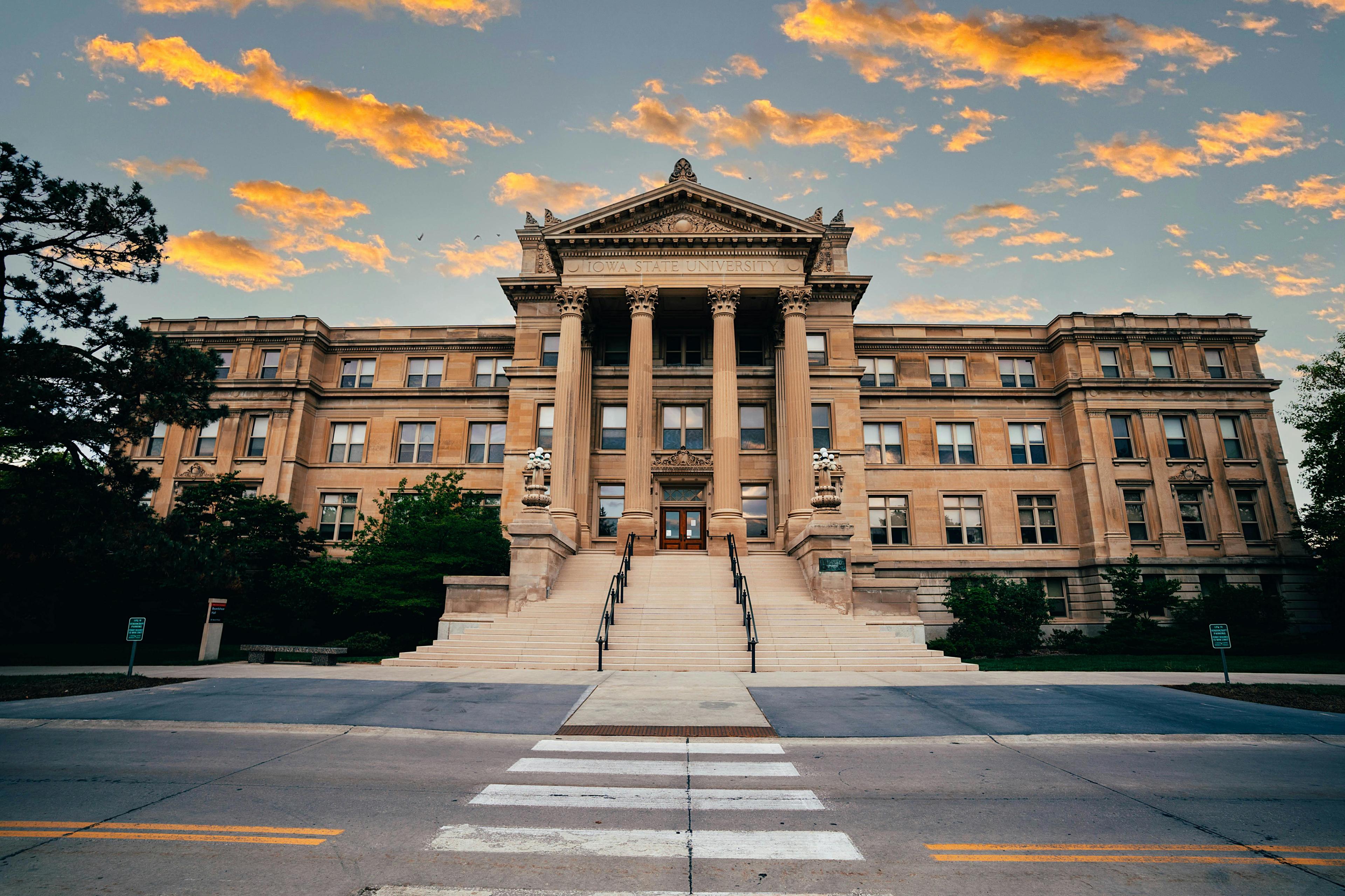 View of Beardshear Hall at Iowa State University during a vibrant sunset.